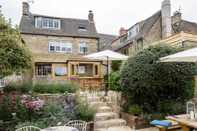 The Old Stocks Inn beer garden and courtyard